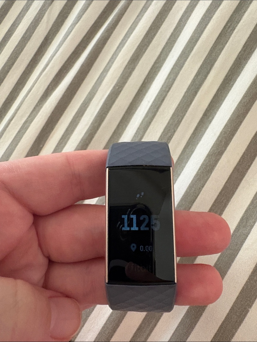 fitbit Charge 3 in Charcoal Gray with Rose Gold with charger